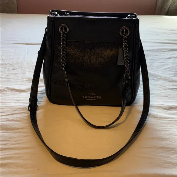 Coach, leather bucket bag with gun metal hardware extra Crossbody strap!